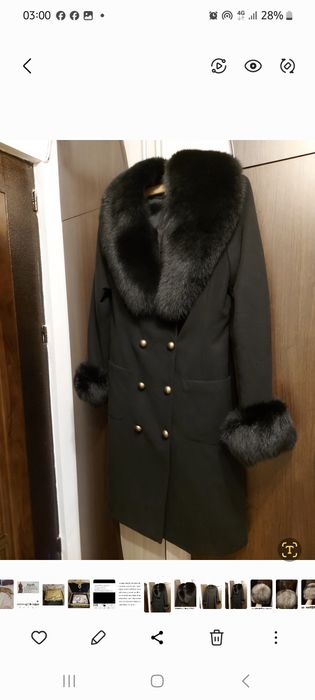 Vând haina din stofa neagra