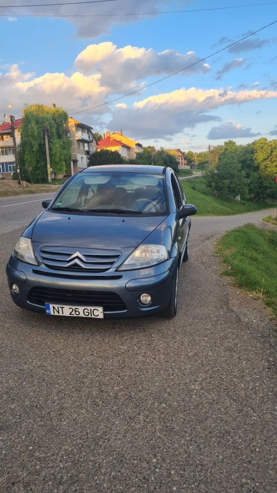 Citroen C3 model exclusive an 2009 1.4 diesel  comenzi volan consum mi