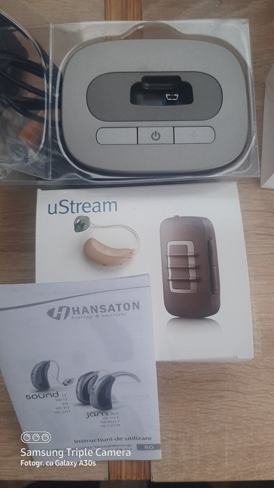 Aparat auditiv Hansaton 7HD cu reglaje.