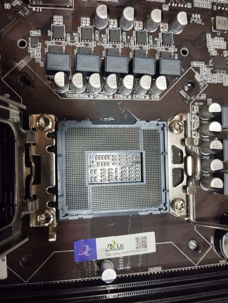 Продам материнскую плату AXLE H610