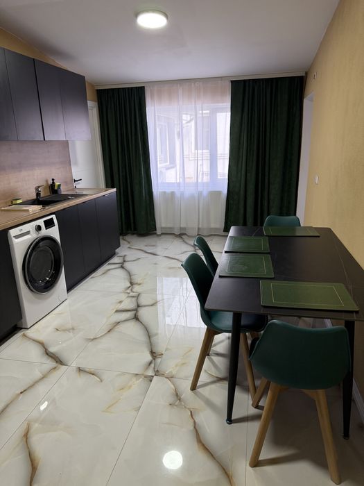 Apartament ultracentral regim hotelier curte + parcare privata