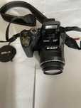 Nikon P100 26x zoom optic,10,3 Mpx,ecran rabatabil, afisare data ora