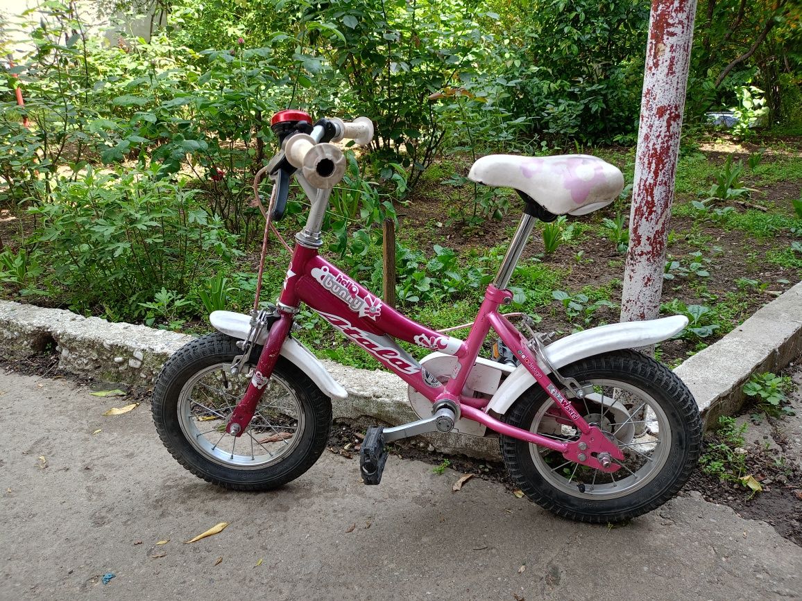 Bicicleta fetiță 3 - 6 ani mărimea roților 12 inch + roți ajutătoare