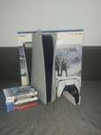 Vand Playstation 5 impreuna cu 9 jocuri cu garantie.
