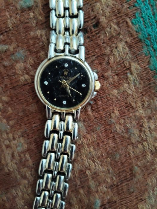 2бр дамски часовници ролекс и белучи