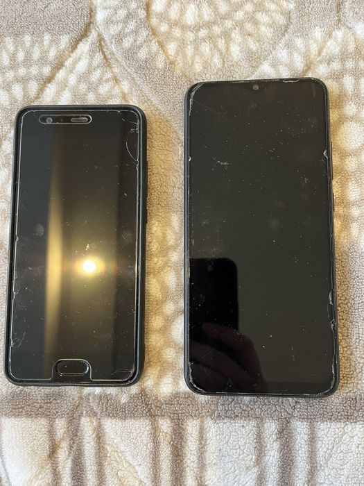 Телефони за части