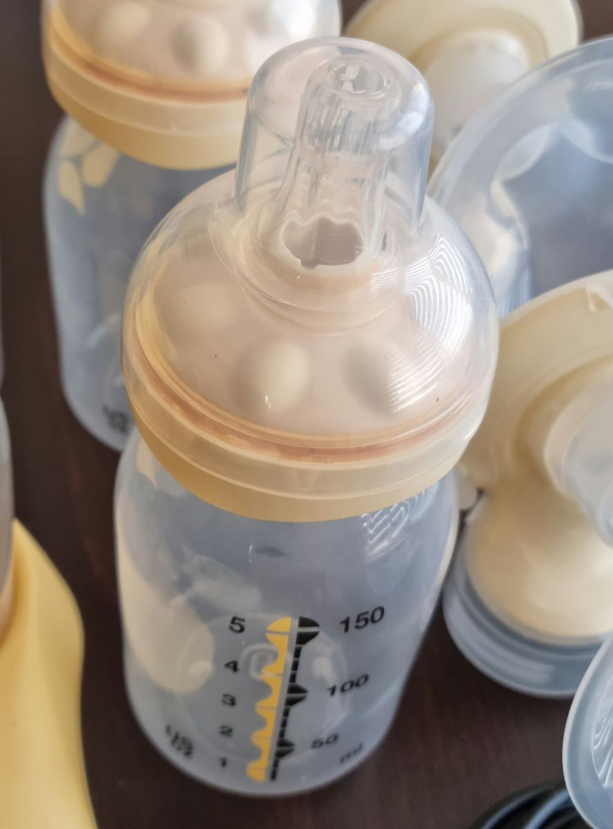 Двойна двуфазна помпа за кърма MEDELA SWING MAXI