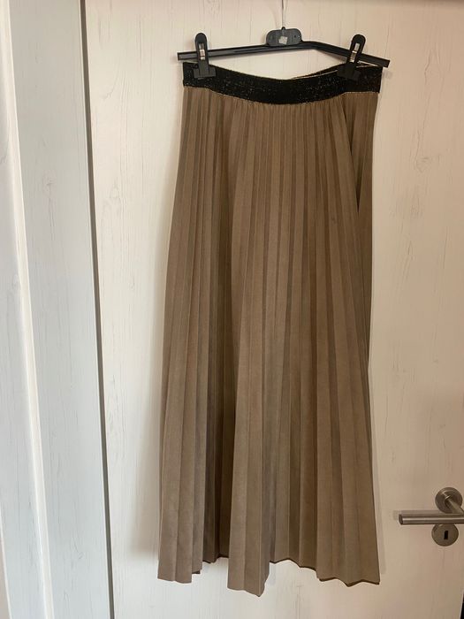 Плисирана пола - различни модели