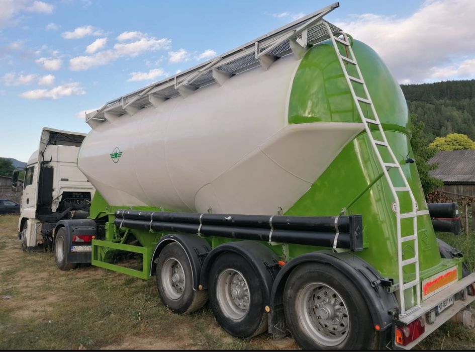 Man TGX+semiremorca Schmitz