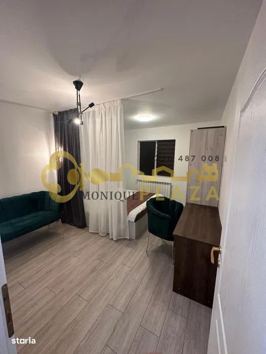 Garsoniera spatiaoasa | Mobilata modern | Zona de dining |