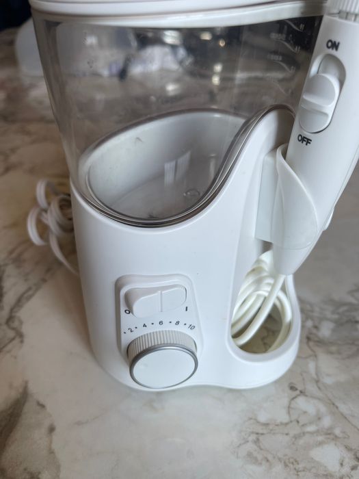 Очистка зубов Waterpik water flosser