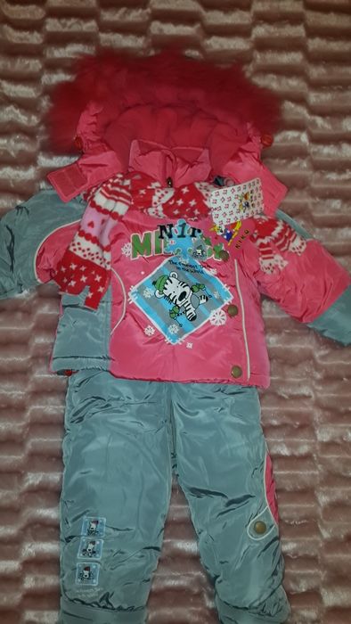 Продам новый зимний комбинезон КIKO.На возраст с 0 до 2 лет.