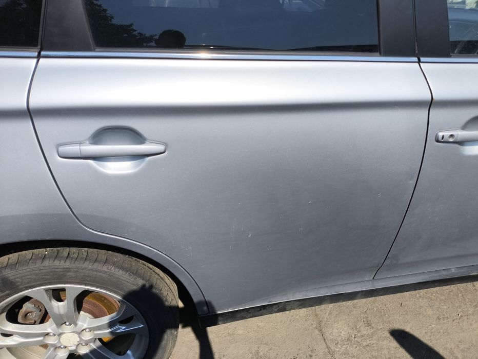 Врата за Mitsubishi Outlander