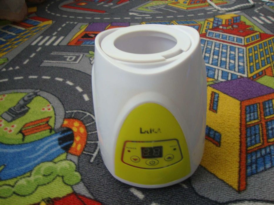 Sterilizator nou de biberoane cu aburi Laica BC1005+încălzitor Laica.