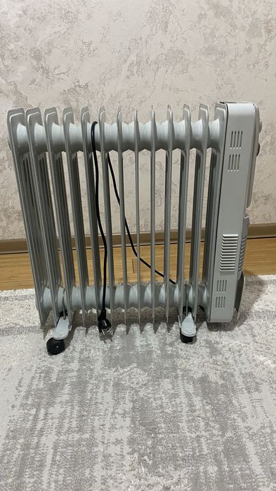 Продам обогреватель масляный