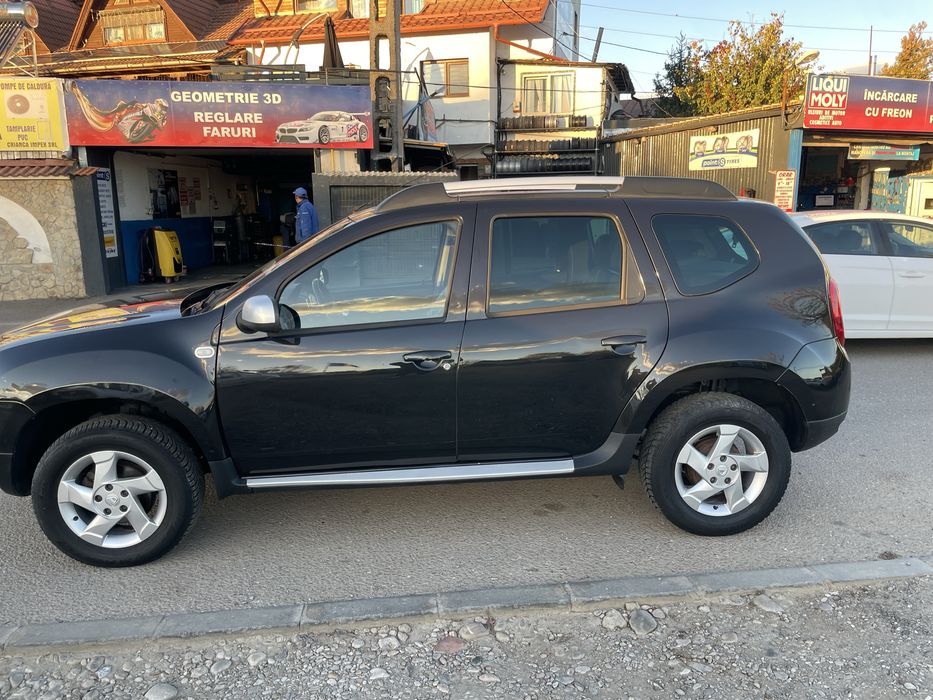 Dacia Duster benzina 1.6 110 cai tractiune 4x4 model prestige