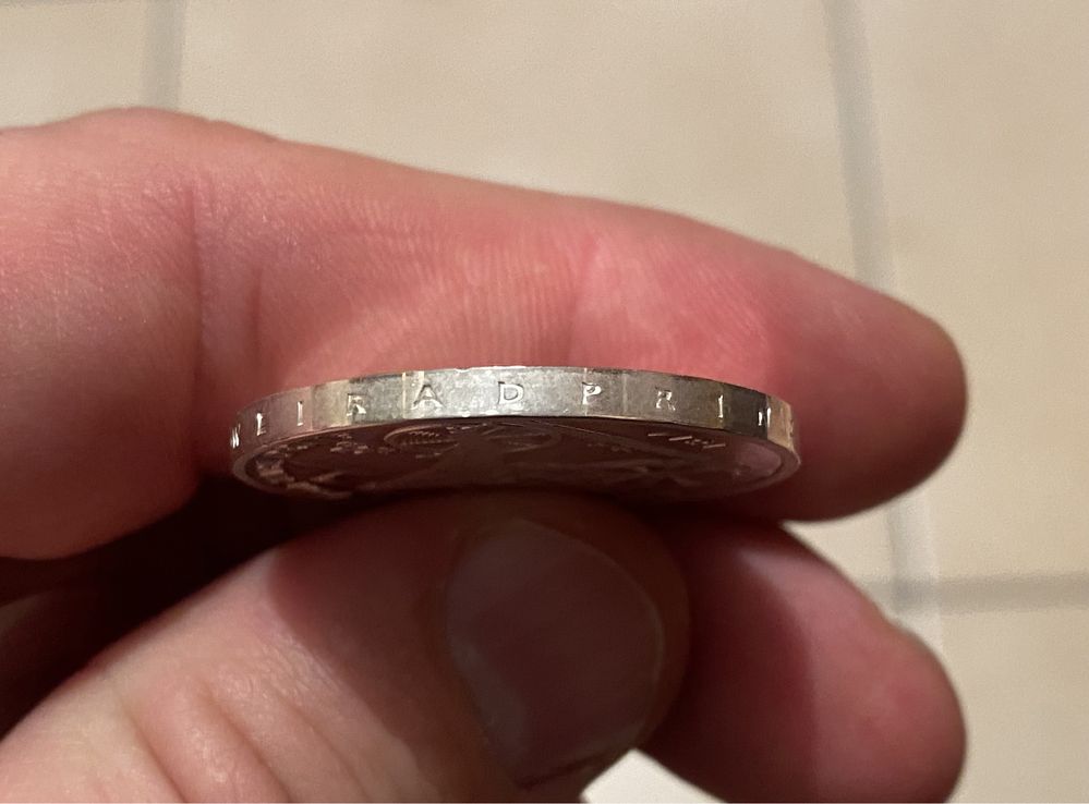 Серебрянная монета 20 евро.