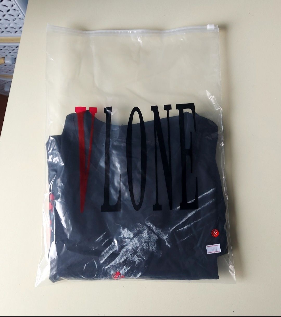 Vlone x Never Broke Again Bones T-shirt
Black