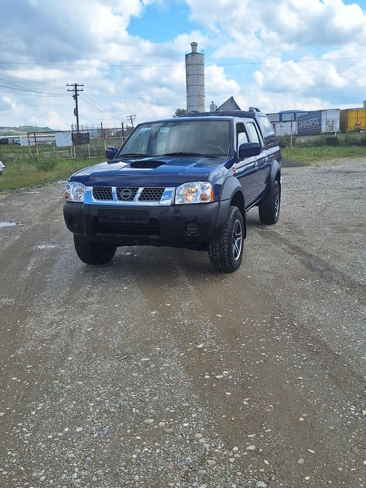 Nissan navara 2.5 diesel 4x4 mic mare ( mazda b2500 bt50)