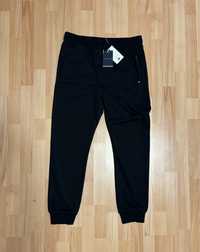 Vand pantaloni Tommy