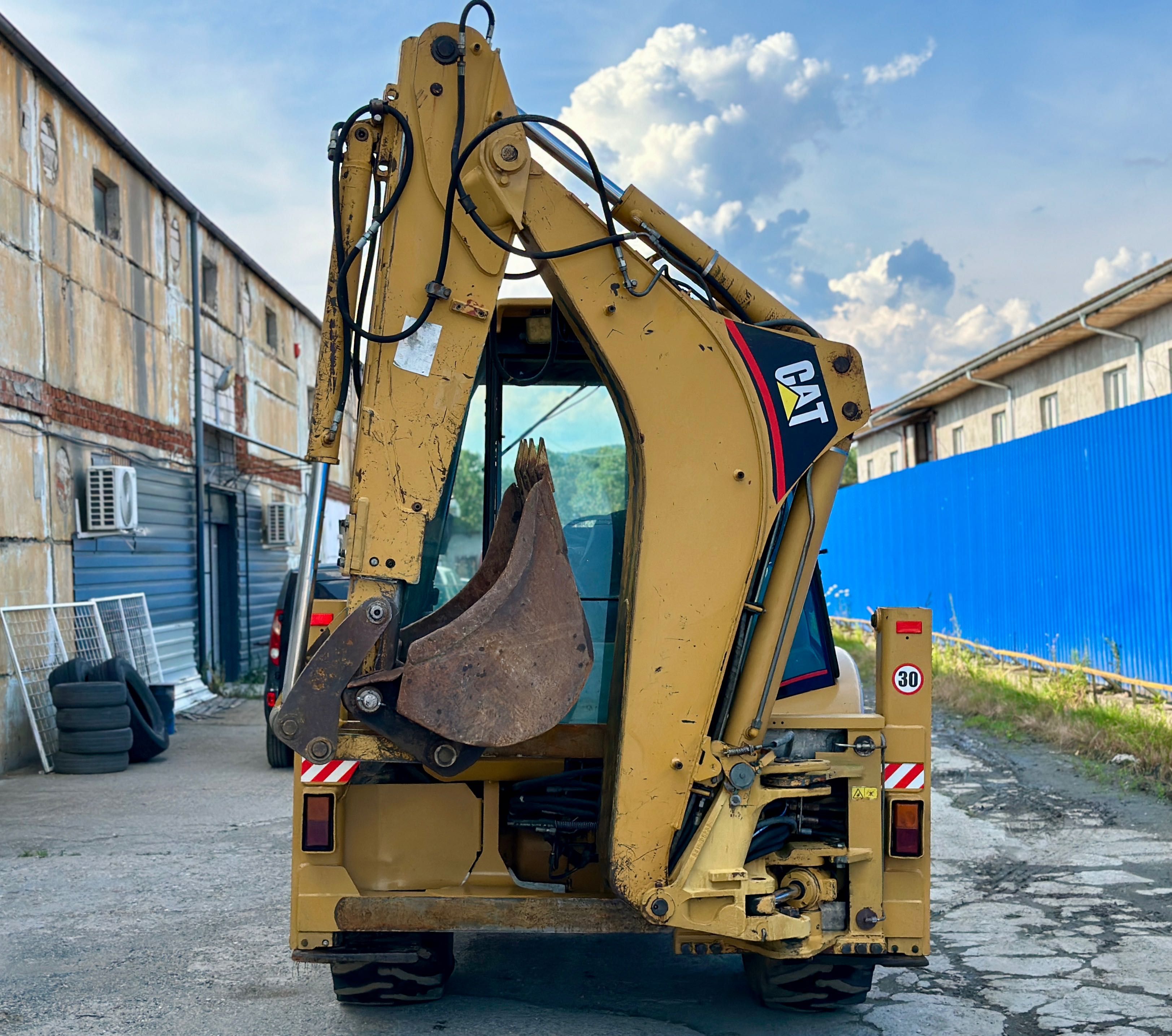 Buldoexcavator Cat / Caterpillar 428D