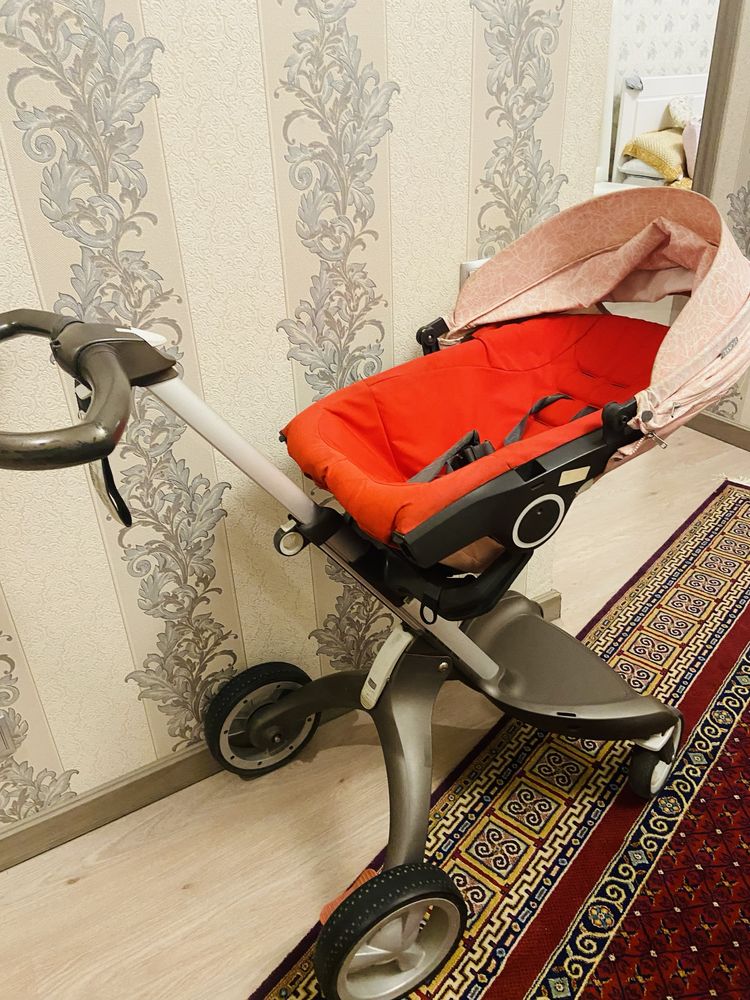 коляска Stokke прогулочная высокая