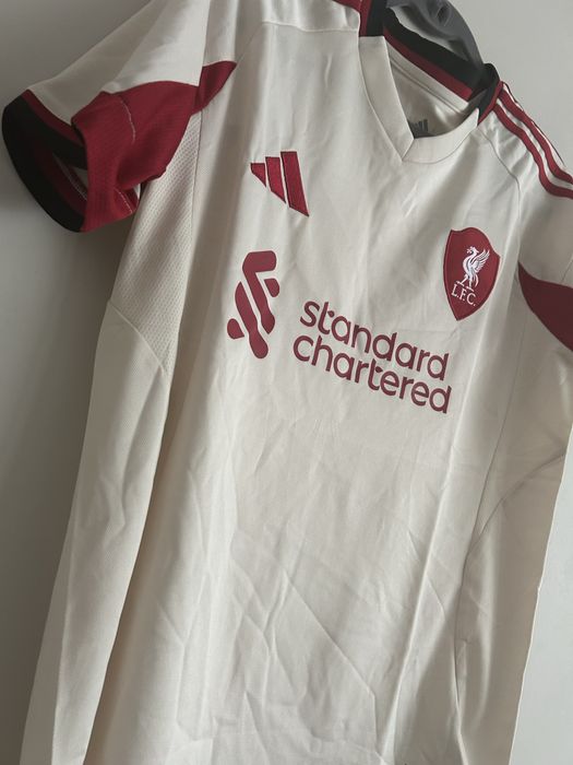 Liverpool,Barcelona home kit