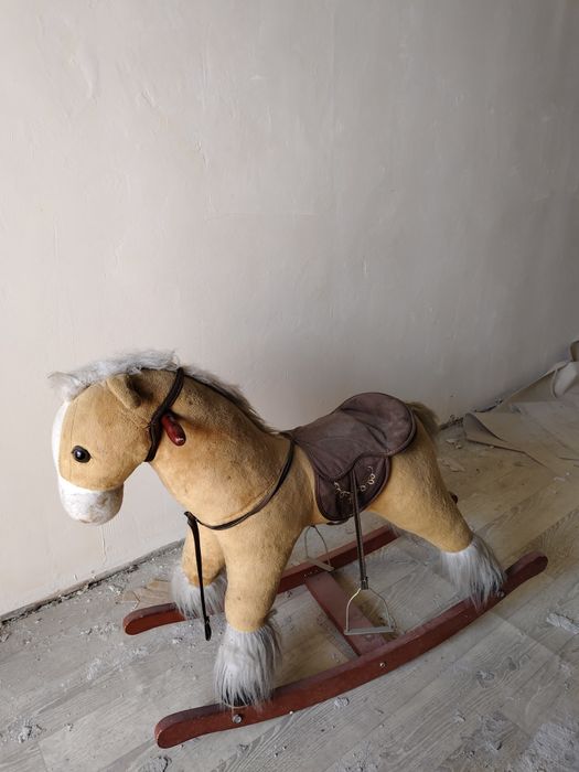 Детская игрушка лошадь