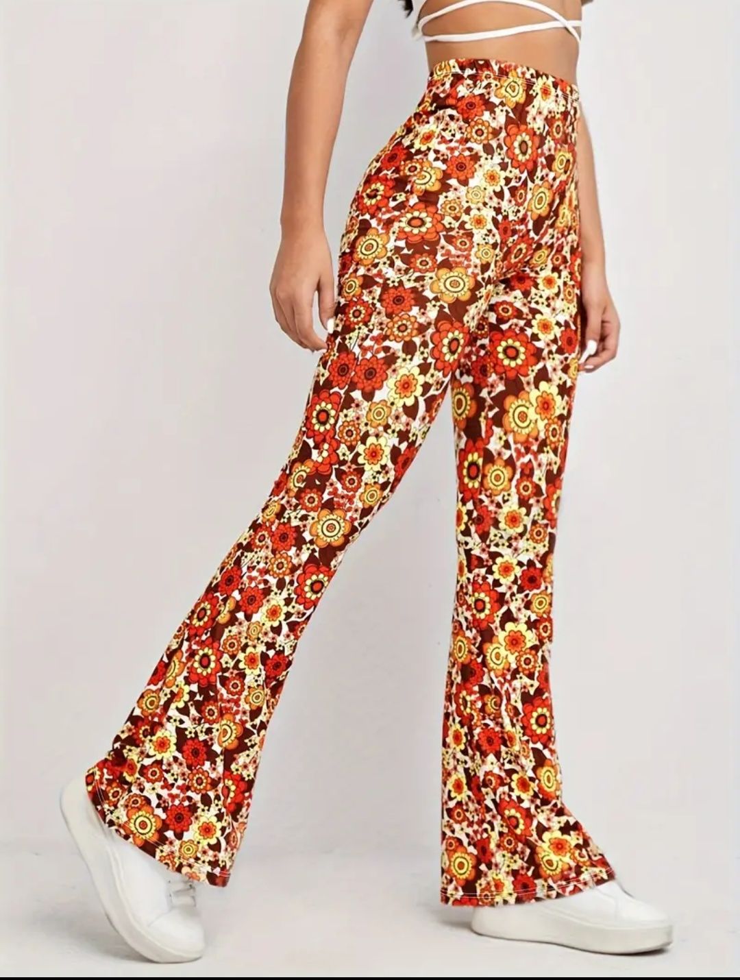 Pantaloni cu talie înaltă și imprimeu floral, model evazat