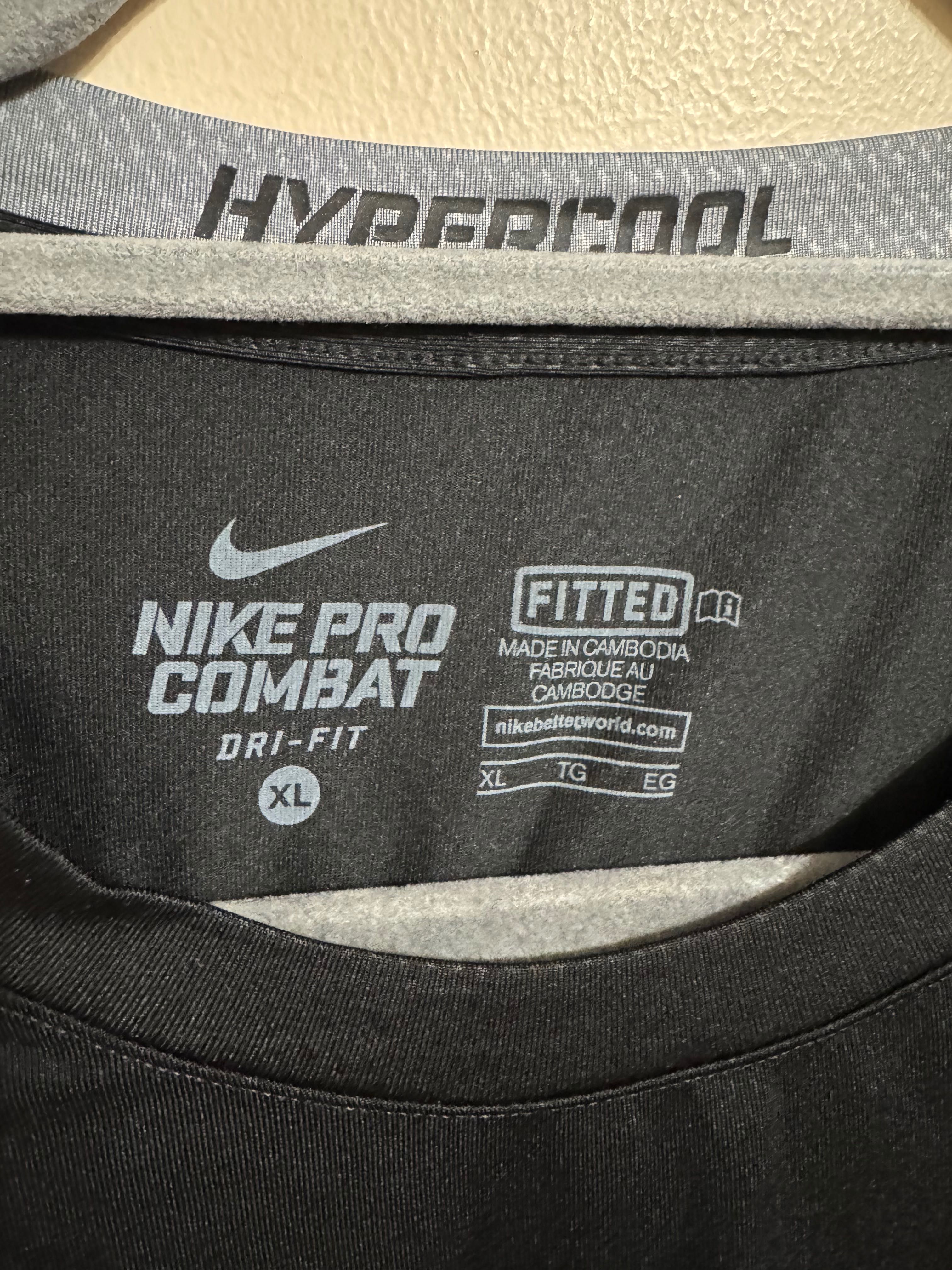 Nike Pro Combat Hypercool Fitted.          Nike Swoosh Tour Center.