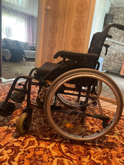 Инвалидная коляска