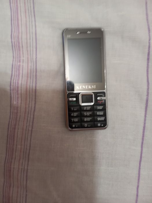 Продам телефон keнкsl