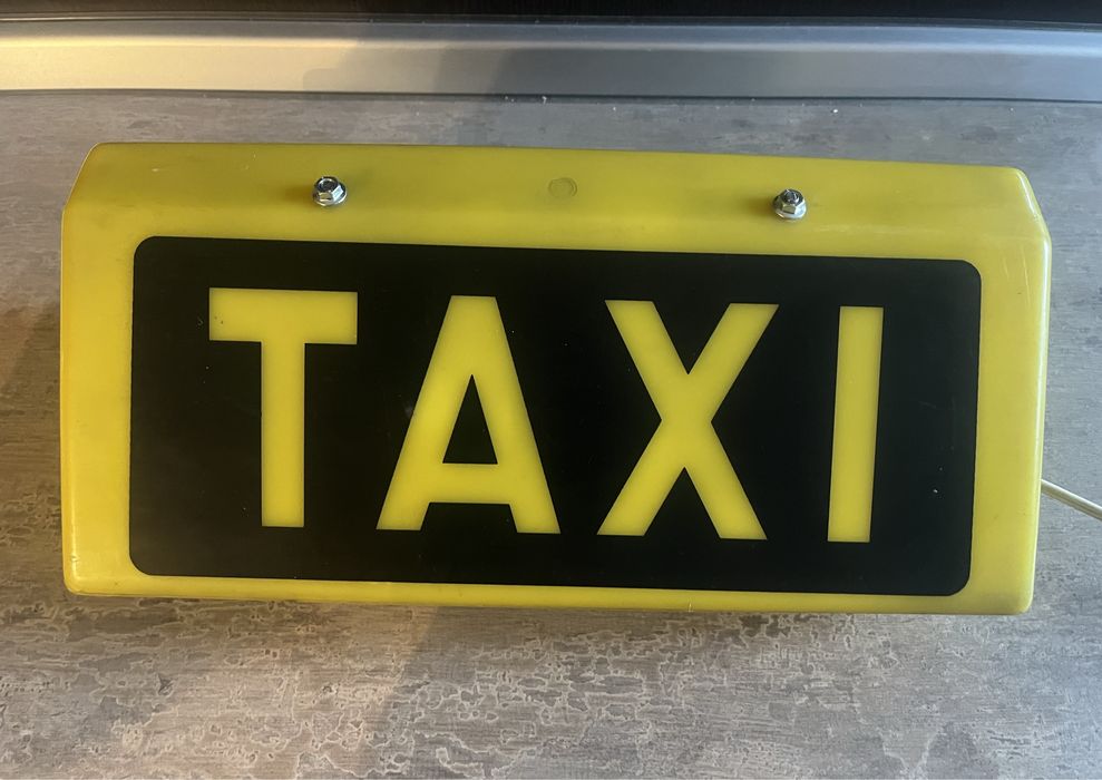 Firma Taxi decorativa