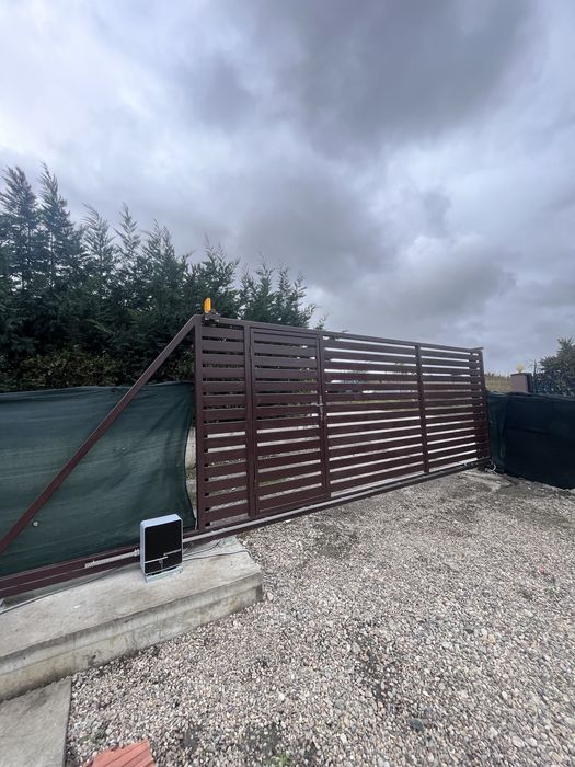 Montaj și automatizări – uși secționale, bariere, sisteme de acces