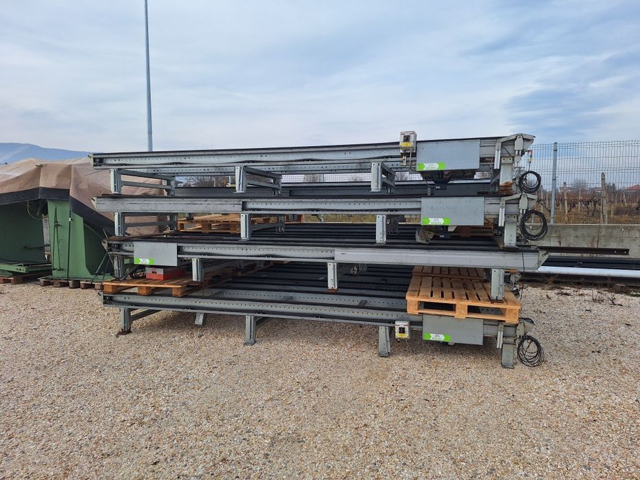 Транспортьори за палети,палетни транспортьории