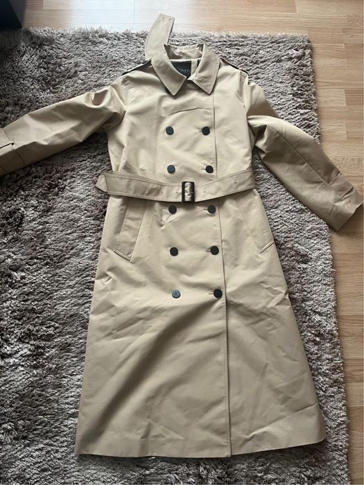 Шлифер чисто нов