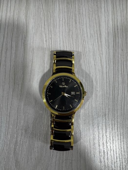 Новые мужские часы из мекки не знаю бренд но состояние идеальное