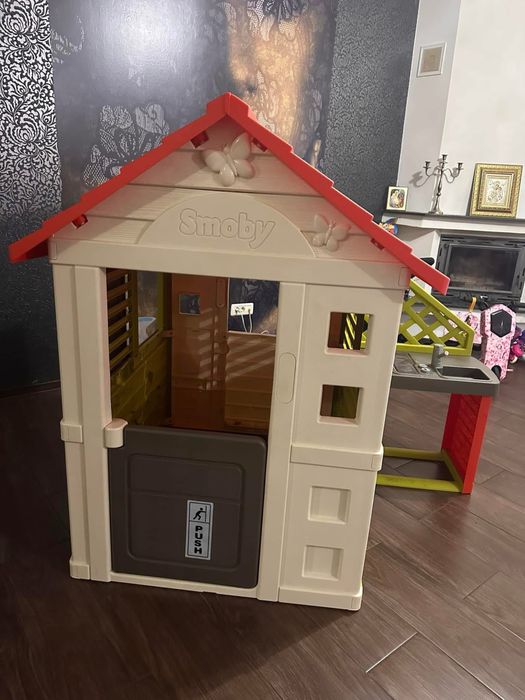 Casuta Smoby Nature Playhouse impecabila a fost montata de cat in casă