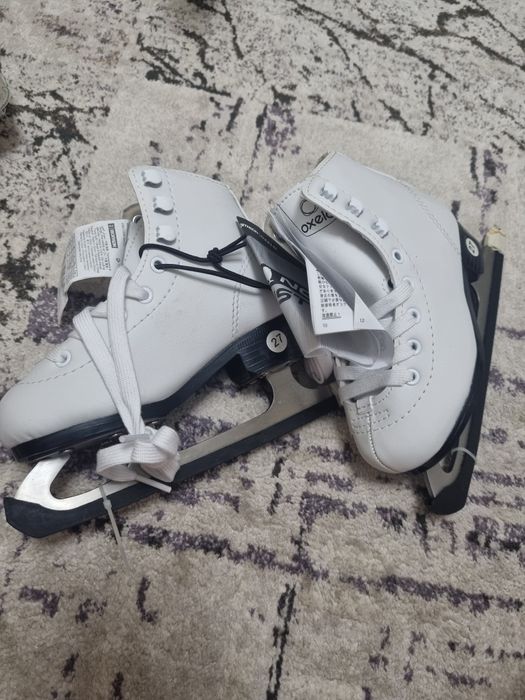 Продам  коньки  фигурные       новые  и  б/у, 27 р-р