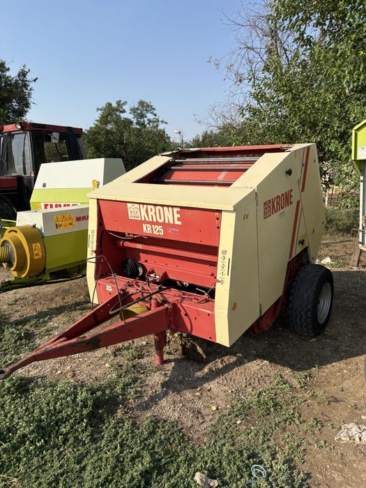 Presa de balotat , balotiera rotundă Claas Rollant 46 , Welger , Deutz