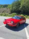 Mazda 323f faruri escamotabile
