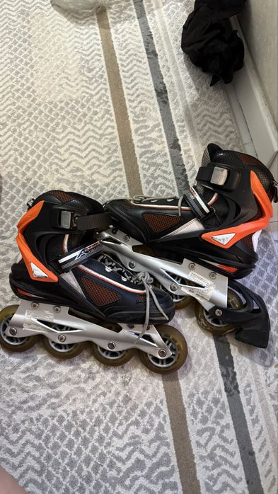 Роликовые коньки