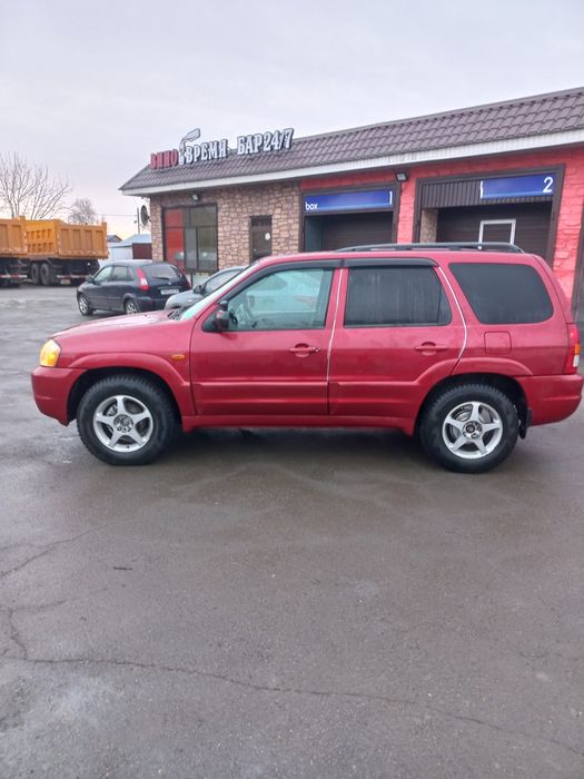 Проас Mazda tribute