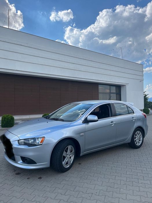 Vând Mitsubishi Lancer Automat 1.8 Benzină