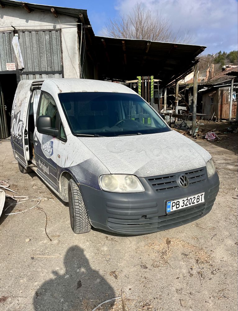 WV Caddy 2.0 бензин/метан