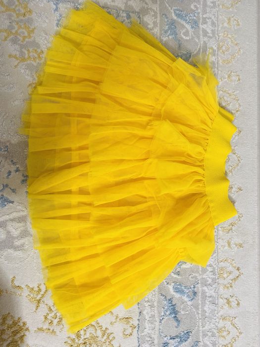 Продам желтый юбка 4-5-6 лет и бантик