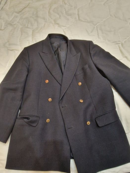 Пиджак двубортный совершенно новый.