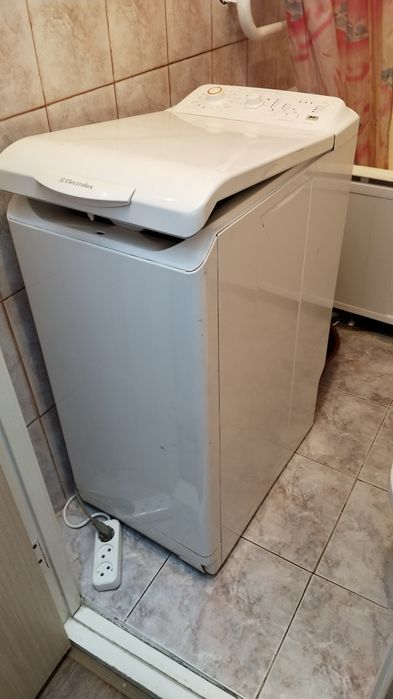 Стиральная машина с вертикальной загрузкой