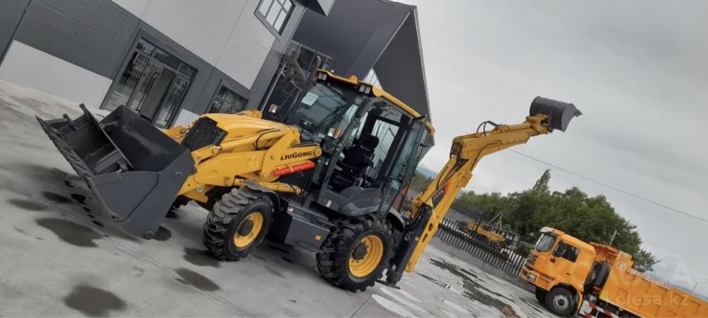 Услуги экскаватора-погрузчика.