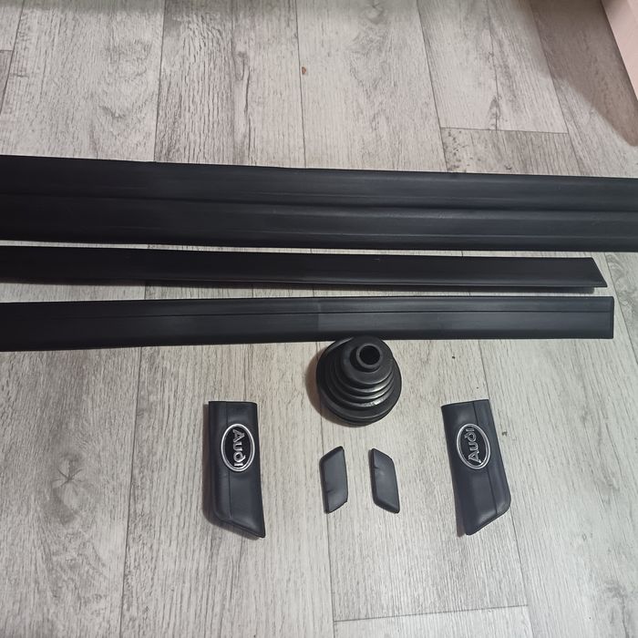 Продам новые молдинги верхние на ауди 100 c4 и также пыльник наружней